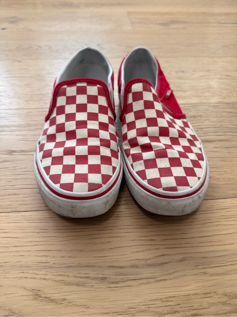 Vans Checkerboard Slip-On Sneakers in Red and White